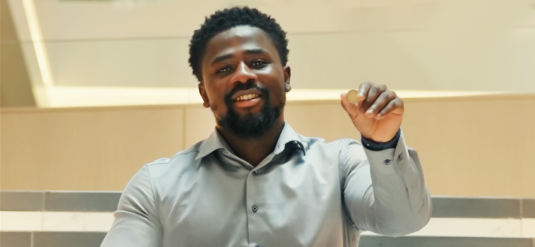 Man with €2 Euro coin