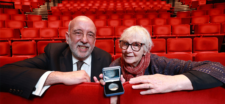 Governor Gabriel Makhlouf and Seán O'Casey's daughter Shivaun with the coin and red seats in the background